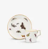 A KPM Berlin porcelain cup and saucer with butterflies by Königliche Porzellanmanufaktur Berlin Kpm, sold Apr 2026