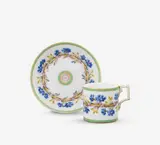 A KPM Berlin porcelain cup and saucer with wheat wreaths and cornflowers by Königliche Porzellanmanufaktur Berlin Kpm, sold Apr 2026