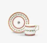 Königliche Porzellanmanufaktur Berlin Kpm, A KPM Berlin porcelain cup and saucer with rose and ivy wreaths