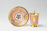 Königliche Porzellanmanufaktur Berlin Kpm, A KPM Berlin porcelain cup "La confidence" and saucer