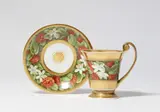 Königliche Porzellanmanufaktur Berlin Kpm, A KPM Berlin porcelain cup and saucer with camellias and daffodils