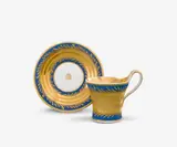 Königliche Porzellanmanufaktur Berlin Kpm, A KPM Berlin porcelain cup and saucer with gold rushes on a matte blue ground
