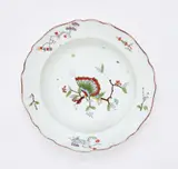 A Meissen porcelain plate with butterfly decor by Meissen Royal Porcelain Manufactory, Blue crossed swords mark with star and dot, press number 19, cancellation mark. Slightly slanted due to firing, glaze we, sold Nov 2025
