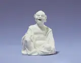 A Meissen white porcelain crouching Buddha by Meissen Royal Porcelain Manufactory, sold Nov 2025