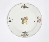 A Meissen porcelain dish painted with a fruit still life and a dog by Meissen Royal Porcelain Manufactory, offered Nov 2025