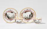 A pair of Meissen porcelain tea bowls and saucers with harbour scenes in cartouches by Meissen Royal Porcelain Manufactory, sold Nov 2025