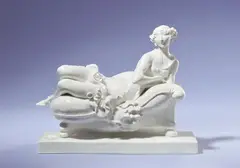 Paul Scheurich, A Meissen porcelain figure of a recumbent woman by Paul Scheurich