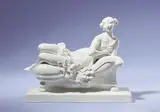 Paul Scheurich, A Meissen porcelain figure of a recumbent woman by Paul Scheurich