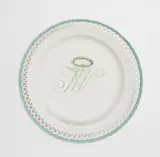 A Berlin KPM porcelain dessert plate from the court service with "green cipher F.W." for the new garden near Potsdam by Königliche Porzellanmanufaktur Berlin Kpm, sold Jun 2025