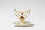A Vienna porcelain vase and saucer with parrot motifs by Imperial Manufactory directed by Matthias Niedermayer Vienna, sold Jun 2025