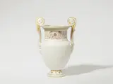 A Berlin KPM biscuit porcelain amphora vase with grotesques by Königliche Porzellanmanufaktur Berlin Kpm, sold Jun 2025