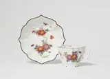 A Meissen porcelain cup and saucer with Chinoiserie decor by Meissen Royal Porcelain Manufactory, Chinese inspired model decorated with branch motifs and 'indianische blumen'. Blue crossed swords mark in enamel. W sauc, sold May 2025