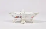 A Meissen porcelain gravy boat with squirrel motifs by Meissen Royal Porcelain Manufactory, sold May 2025
