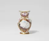 Johann Ehrenfried Stadler, A small Meissen porcelain vase with purple lustre cartouches