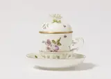 A Meissen porcelain cup and cover / trembleuse with saucer by Meissen Royal Porcelain Manufactory, sold May 2025