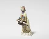 A Meissen porcelain hurdy gurdy player from the monkey band by Meissen Royal Porcelain Manufactory, sold May 2025
