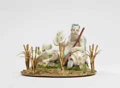 Peter Reinicke, A Meissen porcelain figure of a river god as an allegory of the Vistula in a French ormolu mount