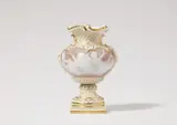 A Meissen porcelain vase with pâte sur pâte painting by Meissen Royal Porcelain Manufactory, sold May 2025