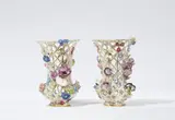A pair of Meissen porcelain vases with floral appliques by Meissen Royal Porcelain Manufactory, sold Apr 2024
