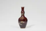 A Berlin KPM Seger porcelain gourd-form vase with sang de boeuf glaze and two Scorpaenidae fish in relief by Königliche Porzellanmanufaktur Berlin Kpm, offered Apr 2024