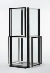 Marcel Breuer, Vitrine S40 by Marcel Breuer, Designed as two glass cubes with black lacquered wood frames placed on top of each other. H 164, W 80, D