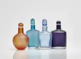 Paolo Venini, Four 'Inciso' bottles
Venini & C., Murano, designed by Paolo Venini 1950s, produced in the 1960s and 1986.