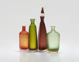 Paolo Venini, Four 'Inciso' bottles
Venini & C., Murano, designed by Paolo Venini, 1950s, produced in the 1960s and 1986.