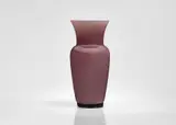 An 'Opalino' vase
Venini & C., Murano, design attributed to Paolo Venini, produced in 1982. by Paolo Venini, Amethyst coloured clear glass with opaque white underlay. Inscribed on the base "venini italia 82". H, sold Nov 2023