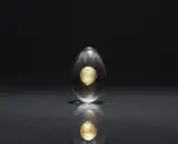 Tapio Veli Ilmari Wirkkala, Egg
Venini & C., Murano, designed by Tapio Wirkkala, around 1968., Solid clear glass with a round gold leaf inclusion. Inscribed "venini italia". L
