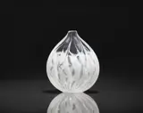 Giampaolo Seguso, A 'Brina' vase
Seguso Viro, Murano, Giampaolo Seguso, 1999, copy no. 40 of 99, Thick clear glass with white filigree thread inclusions. Inscribed on the base Gpaolo Seguso Murano 1999 40/99 "Brina". H