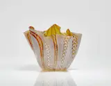 Venini & C. Murano, An amber glass 'Fazzoletto zanfirico' vase
Venini & C., designed by Fulvio Bianconi, around 1950, produced in the 1960s.