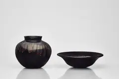 Alfredo Barbini, A black glass dish and a vase
Vetreria Alfredo Barbini, Murano, 1960s/1970s.