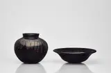 Alfredo Barbini, A black glass dish and a vase
Vetreria Alfredo Barbini, Murano, 1960s/1970s.