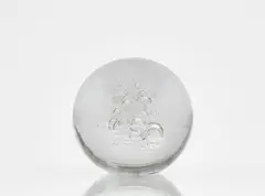Alfredo Barbini, A large glass sphere
Vetreria Alfredo Barbini, Murano, presumably 1970s., Solid clear glass paperweight with bubble inclusions. Inscribed on the stand "Barbini Murano", manufacturer's label. H ca. 20, D ca
