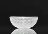 Lalique Verrerie, A Coupe Nemours
Lalique, Wingen-sur-Moder, designed in 1929, produced 1980s/1990s., Clear mould-pressed glass, patinated, black glass droplets