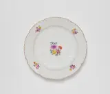 A Meissen porcelain dinner plate from a service for King Frederick II by Meissen Royal Porcelain Manufactory, sold Apr 2023