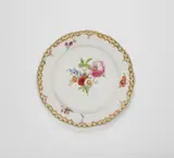 A Berlin KPM porcelain plate from a dinner service with floral decor by Königliche Porzellanmanufaktur Berlin Kpm, offered Apr 2023