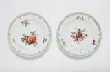 A pair of Berlin KPM porcelain plates from a dinner service with flowers and fruit by Königliche Porzellanmanufaktur Berlin Kpm, sold Apr 2023