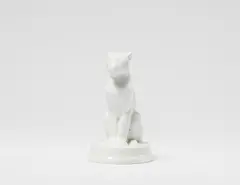 Anton Puchegger, A Berlin KPM white porcelain figure of a seated panther