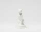 Anton Puchegger, A Berlin KPM white porcelain figure of a seated panther