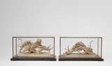 Benedikt Fruth, Two terracotta hunting groups:
Three Dogs with a Lion and Three Dogs with a Lioness, Under glass on ebonised wood plinths. Both groups c. H 14, W 26.5, D