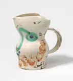 Pablo Picasso, Visage aux cercles, 1969, Ceramic jug. White clay, grey engobe painting and glazed white, with partial coloured decor; ceramic, Madoura edition