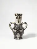 Vase deux anses hautes by Pablo Picasso, 1952, Ceramic pitcher. White clay, black and grey engobed and white glazed with incised decoration, glazed inside; ceramic, Ma, sold Jun 2022
