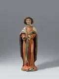 Hans Klocker, A carved wood figure of Saint John the Evangelist by Hans Klocker and workshop