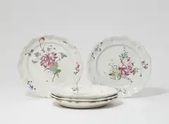 Joseph Hannong, Five Strasbourg faience plates with "fleurs contournées" decor