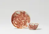 A museum quality Vienna porcelain tea bowl and saucer painted by Ignaz Preissler by Manufaktur Claudius Innocentius Du Paquier Wien, sold May 2022