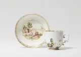 A Meissen porcelain cup and saucer with "hausmaler" decor by Meissen Royal Porcelain Manufactory, sold May 2022