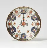 A Meissen porcelain plate with Japanese style lambrequin motifs by Meissen Royal Porcelain Manufactory, sold May 2022