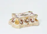 A Meissen porcelain clock stand with garden landscapes by Meissen Royal Porcelain Manufactory, offered May 2022