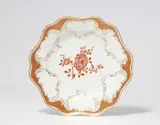 A Meissen porcelain dinner plate from a service with iron red mosaic borders by Meissen Royal Porcelain Manufactory, sold May 2022
